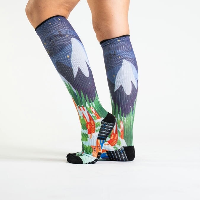 A person in festive compression socks