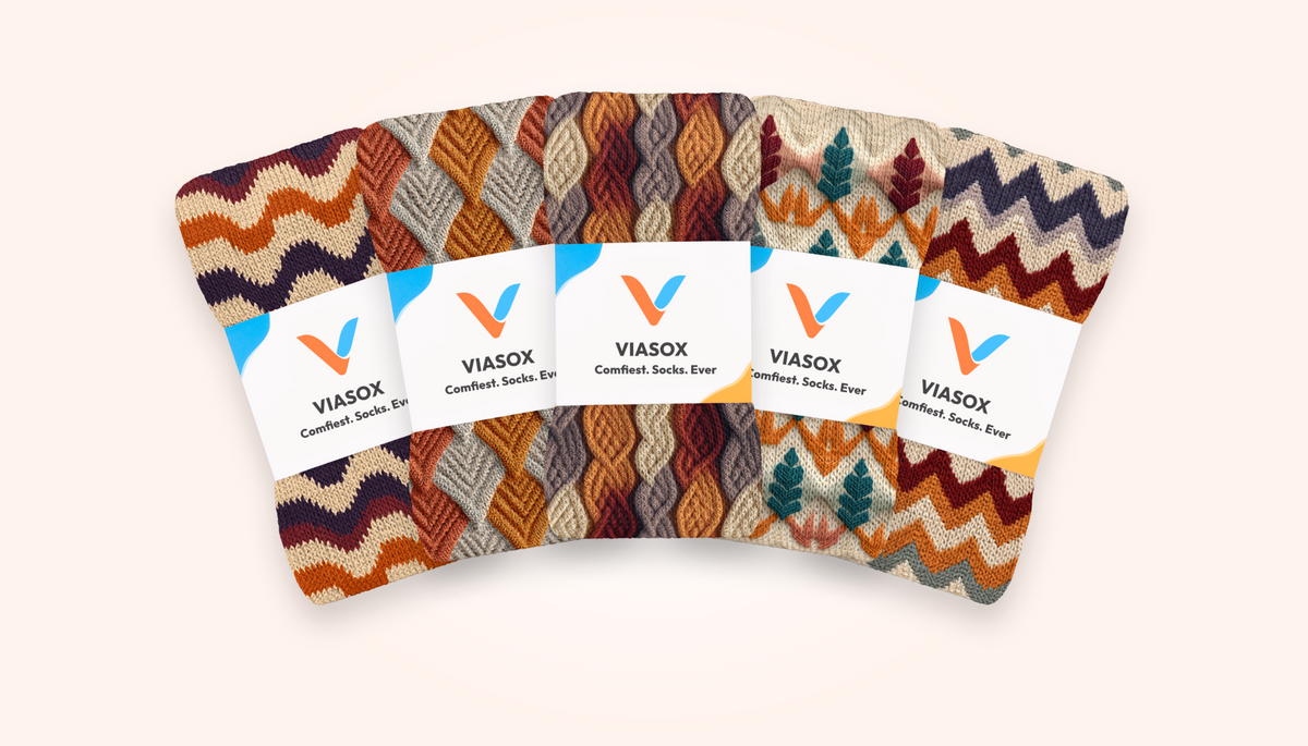 Five Viasox Ankle Compression socks fanned out showing this week's knit-in patterns