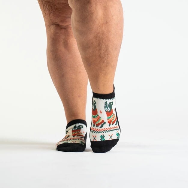 A person wearing Christmas ankle socks