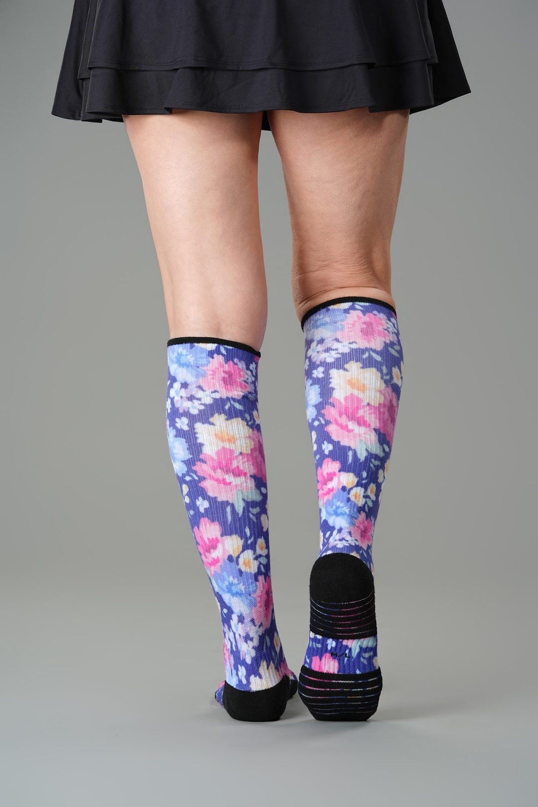 Back view of floral Viasox compression socks