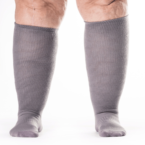 A model wearing gray stretchy socks