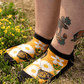 A person wearing monarch ankle socks