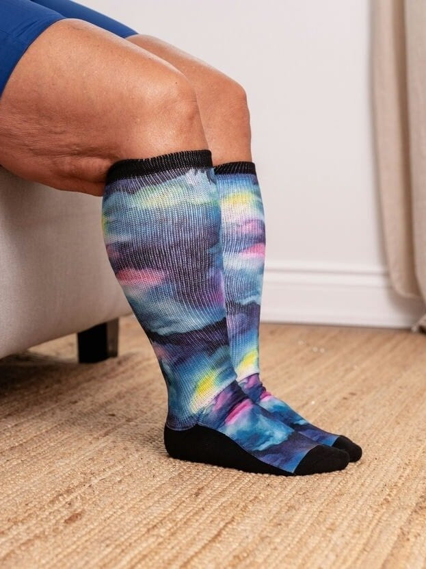 Patterned EasyStretch™ socks worn while seated