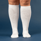 A person wearing white socks