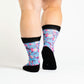 A person wearing cherry blossom crew socks
