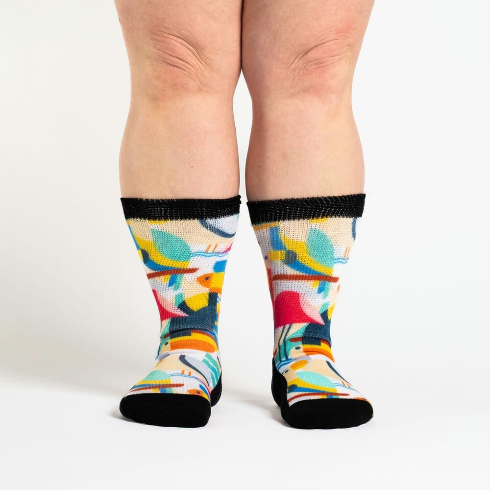 A person wearing crew toucan socks